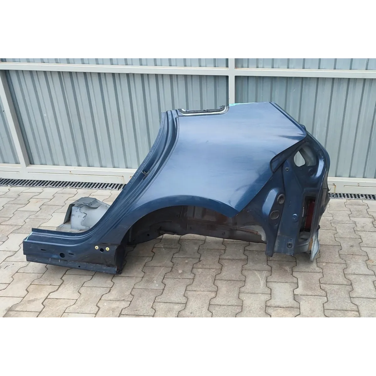 VOLVO V40 ĆWIARTKA BŁOTNIK LEWY TYŁ 498