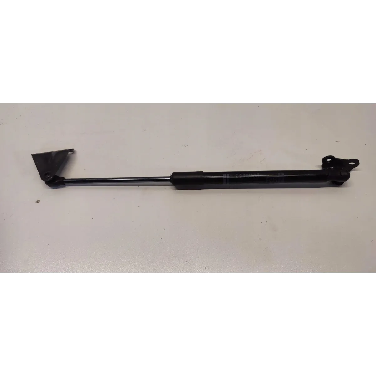 MAZDA 2 TOYOTA YARIS IV SILNICZEK KLAPY BAGAŻNIKA PRAWY 69850-K0020