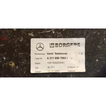 MERCEDES W211 BOCZEK BAGAŻNIKA LEWY A2116907853