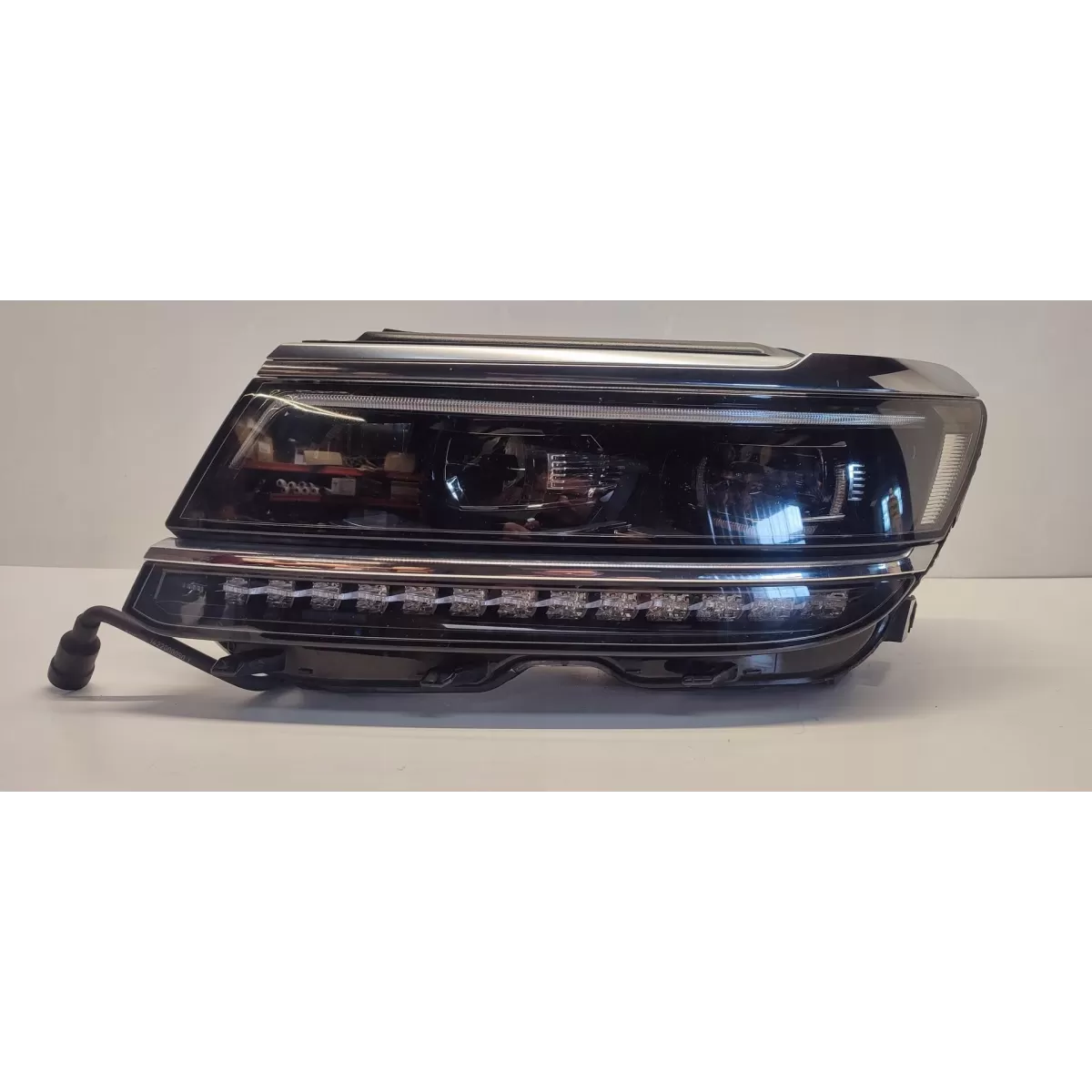 VW TIGUAN II LAMPA LEWY PRZÓD ANGLIK RHD 5NC941081A